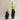 Small and large NOVA brown vases with flowers.